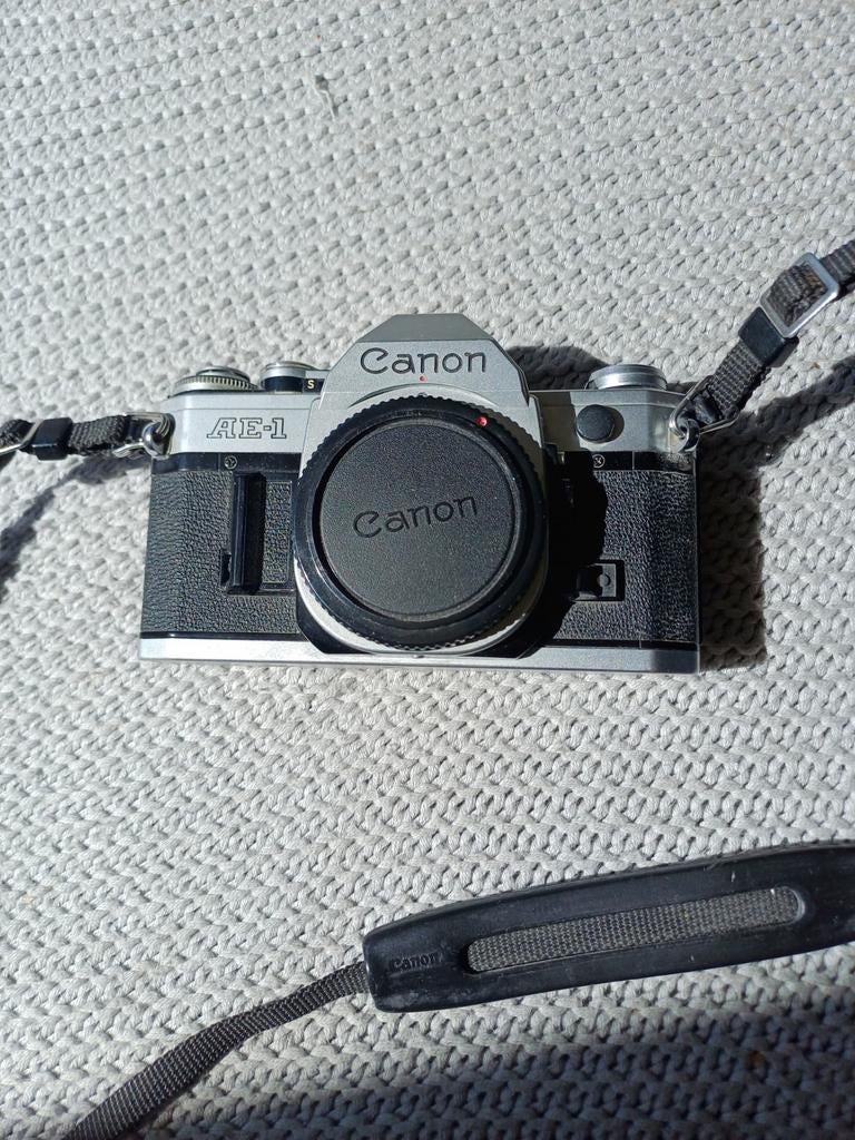 Canon AE-1 spiegelreflexcamera met lensdop, Audio, Tv en Foto, Fotocamera's Analoog, Ophalen of Verzenden, Gebruikt, Spiegelreflex