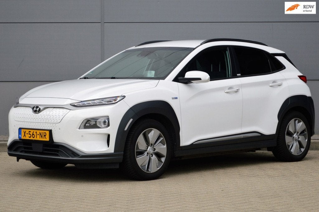 Hyundai Kona EV Premium Sky 64 kWh, Auto's, Hyundai, Gebruikt, 174 min, Wit, Adaptive Cruise Control