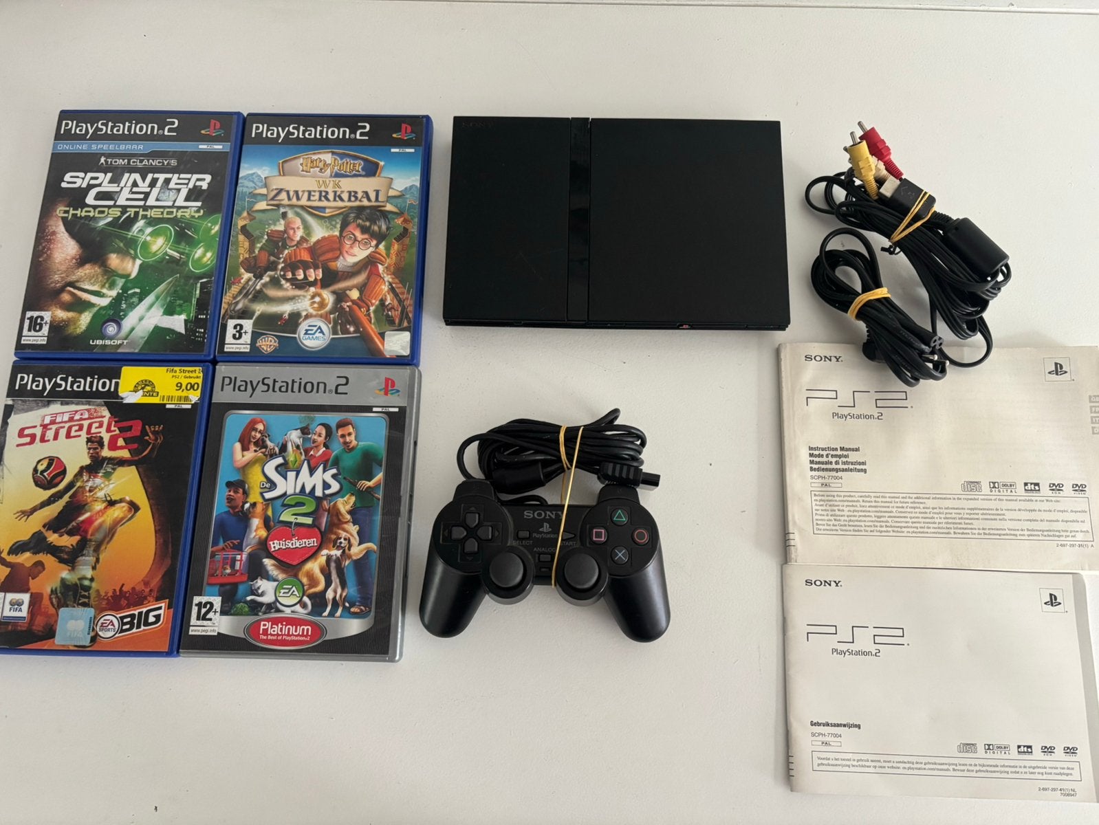 PlayStation 2, Spelcomputers en Games, Spelcomputers | Sony PlayStation 2, Zwart, Ophalen of Verzenden, Met 1 controller, Slim
