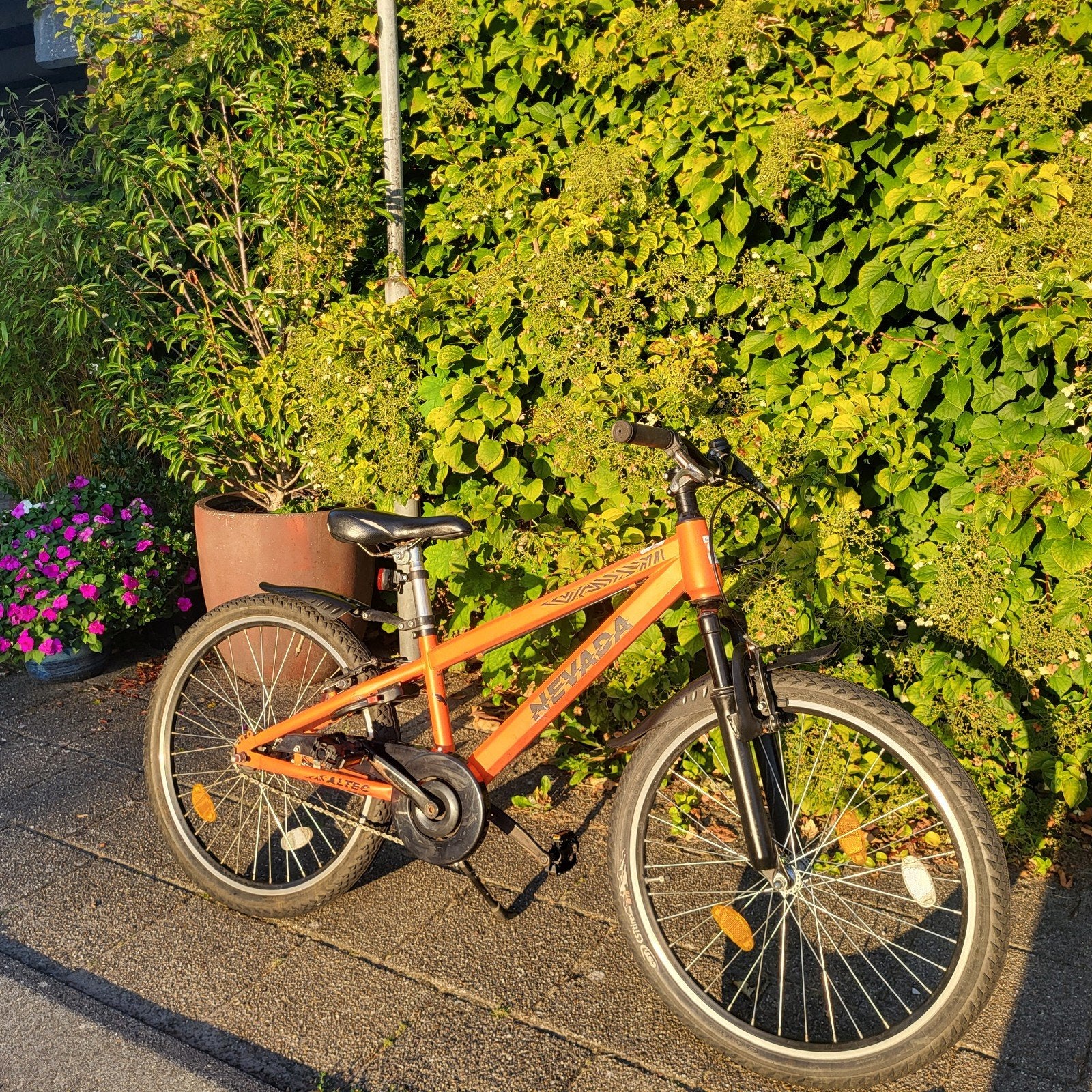 Nevada kinderfiets 24 inch - Oranje, Fietsen en Brommers, Fietsen | Kinderfietsjes, Ophalen, 20 inch of meer, Gebruikt, Nevada
