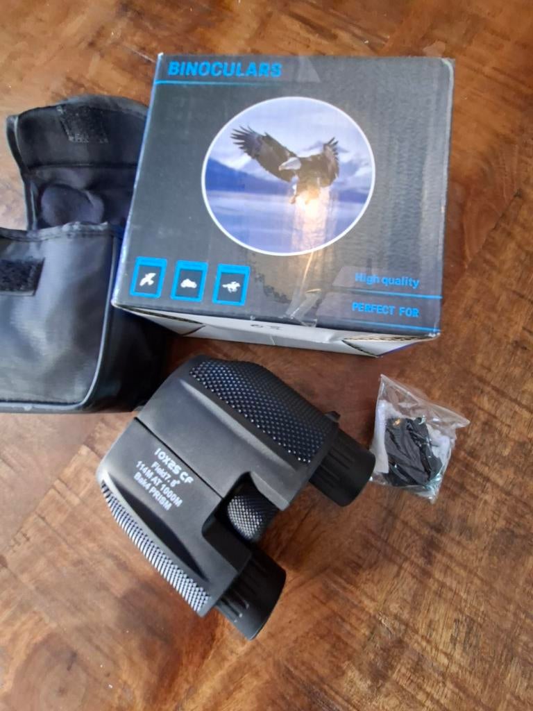 Nieuwe compacte verrekijker 10x25 met tas en draagkoord, Audio, Tv en Foto, Optische apparatuur | Verrekijkers, Dakkant (recht)