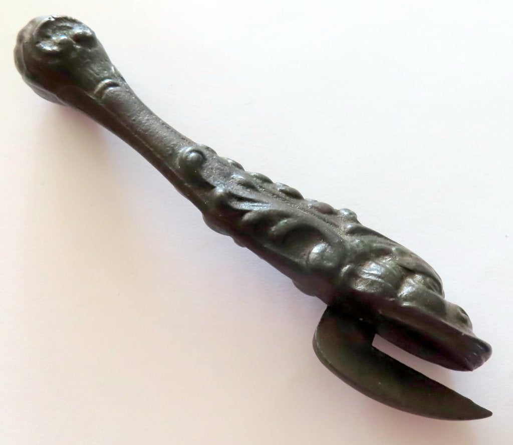 Koopje! Antiek ijzeren blikopener vis (dolfijn) incl verzend, Verzenden