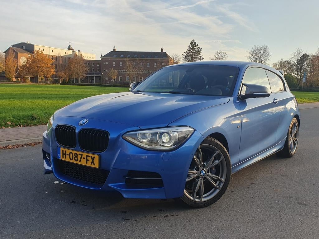 BMW 1-Serie 3.0 M135i 3DR AUT 2013 Blauw, Auto's, 1490 kg, Zwart, Vierwielaandrijving, Particulier