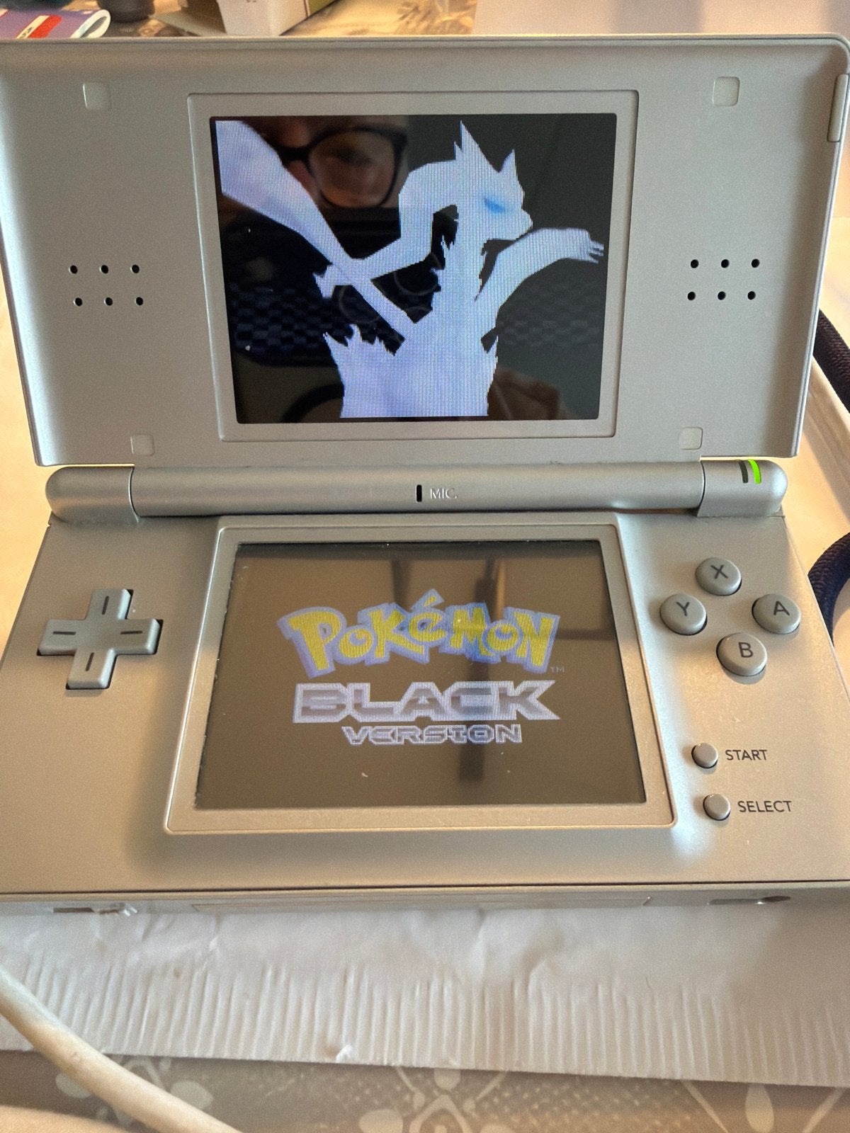 Nintendo DS Lite met Pokémon Black Version, Spelcomputers en Games, Spelcomputers | Nintendo DS, Ophalen of Verzenden, Zilver