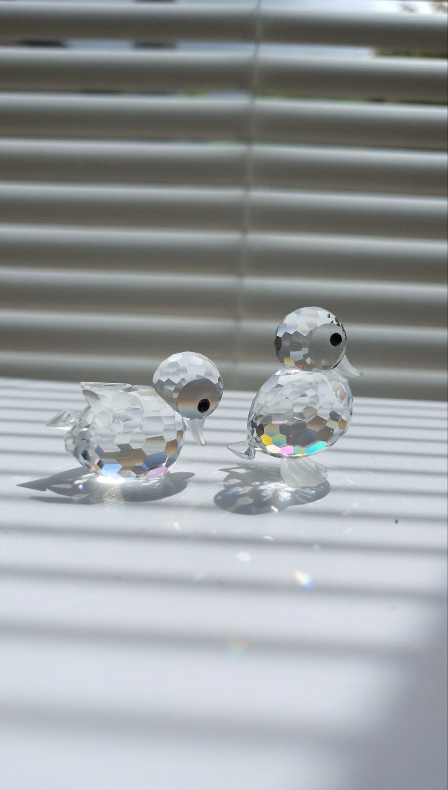Swarovski eend zwemmend en staand, Ophalen of Verzenden, Zo goed als nieuw, Figuurtje