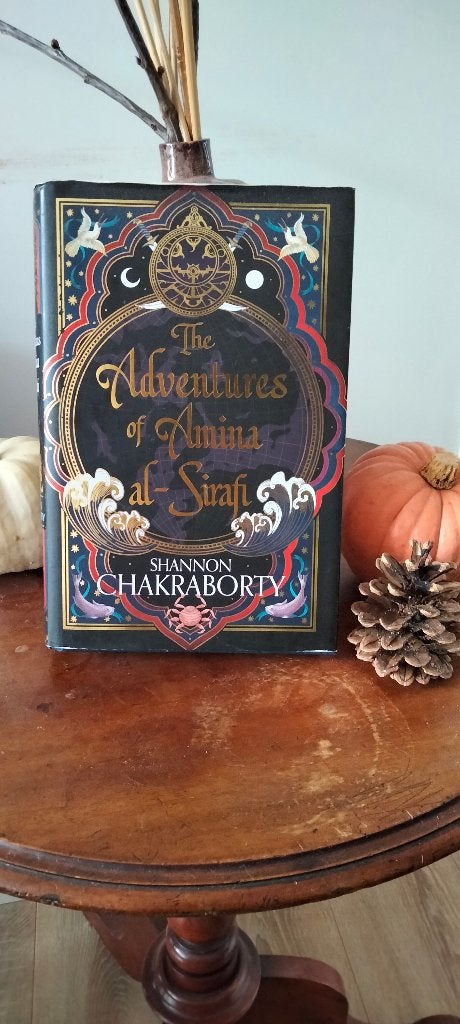 The adventures of Amina Al-Sirafi - gesigneerd, Boeken, Fantasy, Ophalen of Verzenden, Zo goed als nieuw, Shannon Chakraborty