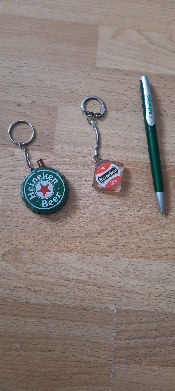 Heineken sleutelhangers en pen - verzamelobjecten, Ophalen of Verzenden, Gebruikt, Merk