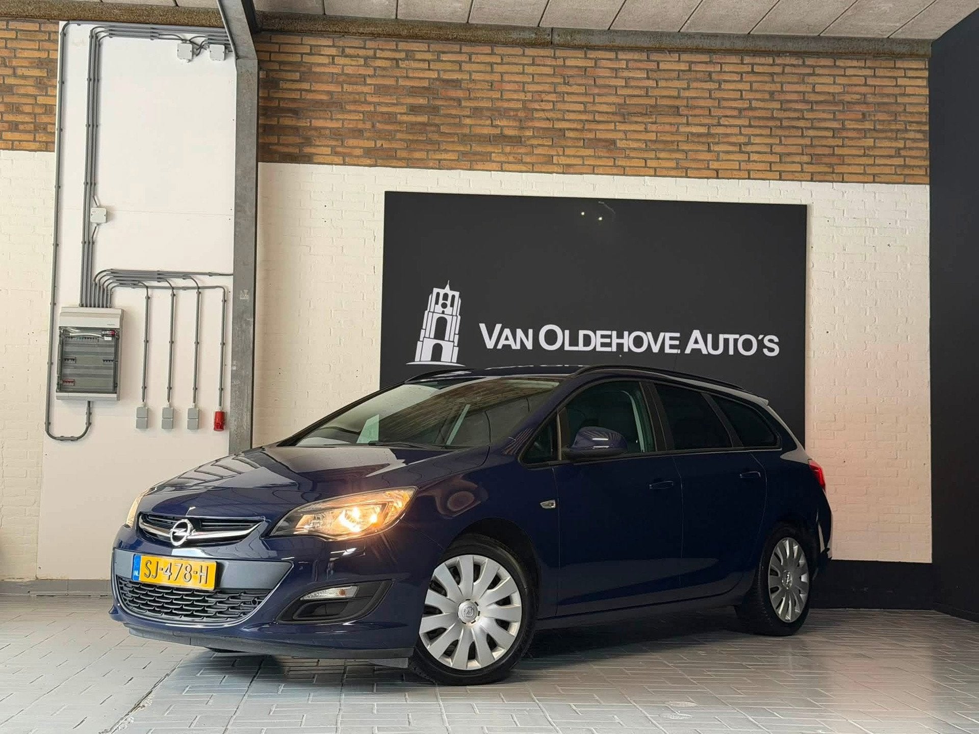 Opel Astra Sports Tourer 1.4 Turbo Sport +, Voorwielaandrijving, Euro 5, Gebruikt, 4 cilinders
