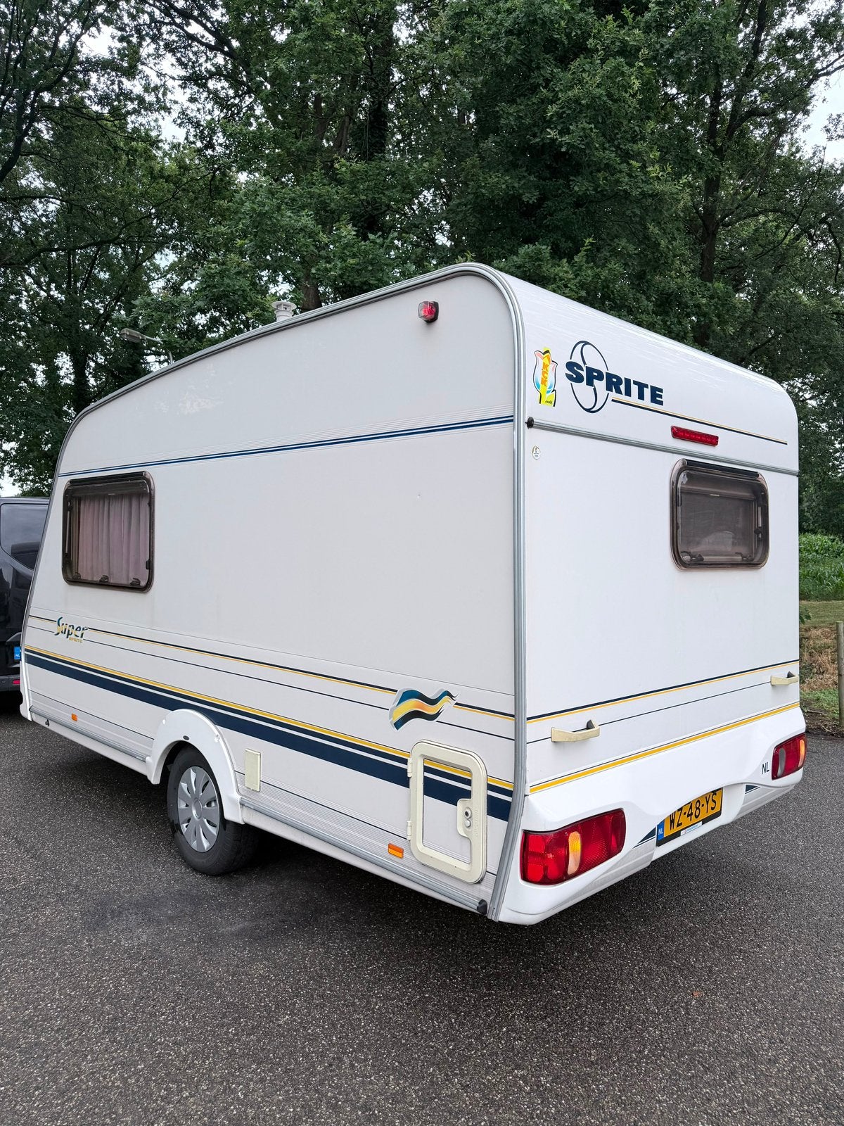 Nette Sprite 390 caravan uit 2001, Overige merken, Omvormbare zithoek, Bedrijf, Treinzit