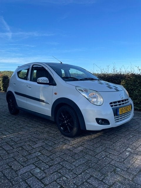 Suzuki Alto 1.0 2012 Wit, Auto's, Voorwielaandrijving, Stof, 200 kg, 4 stoelen