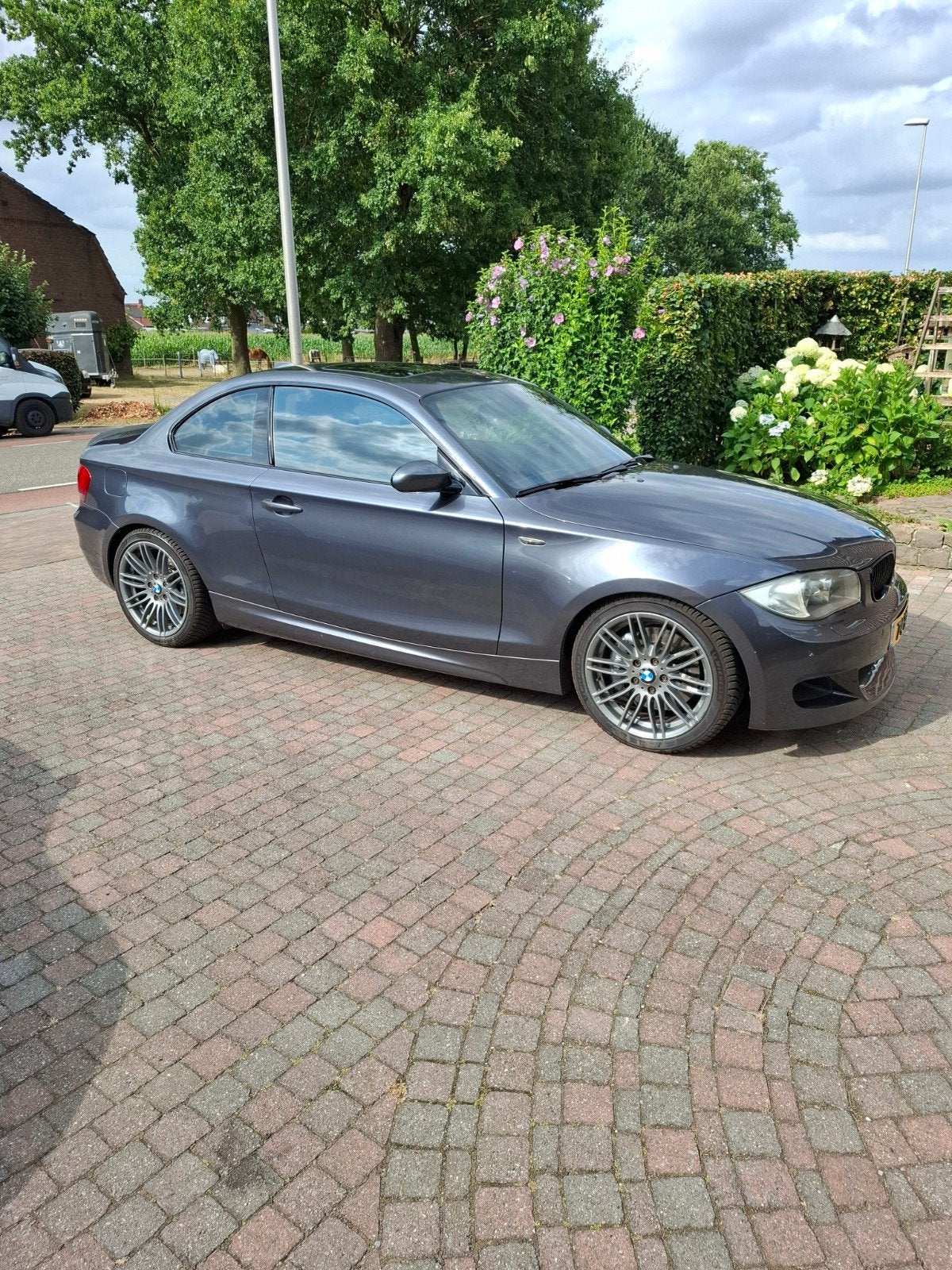 BMW 1-Serie 3.0 135I Coupe AUT 2008 Grijs, Auto's, Achterwielaandrijving, 4 stoelen, 1465 kg, 11 km/l
