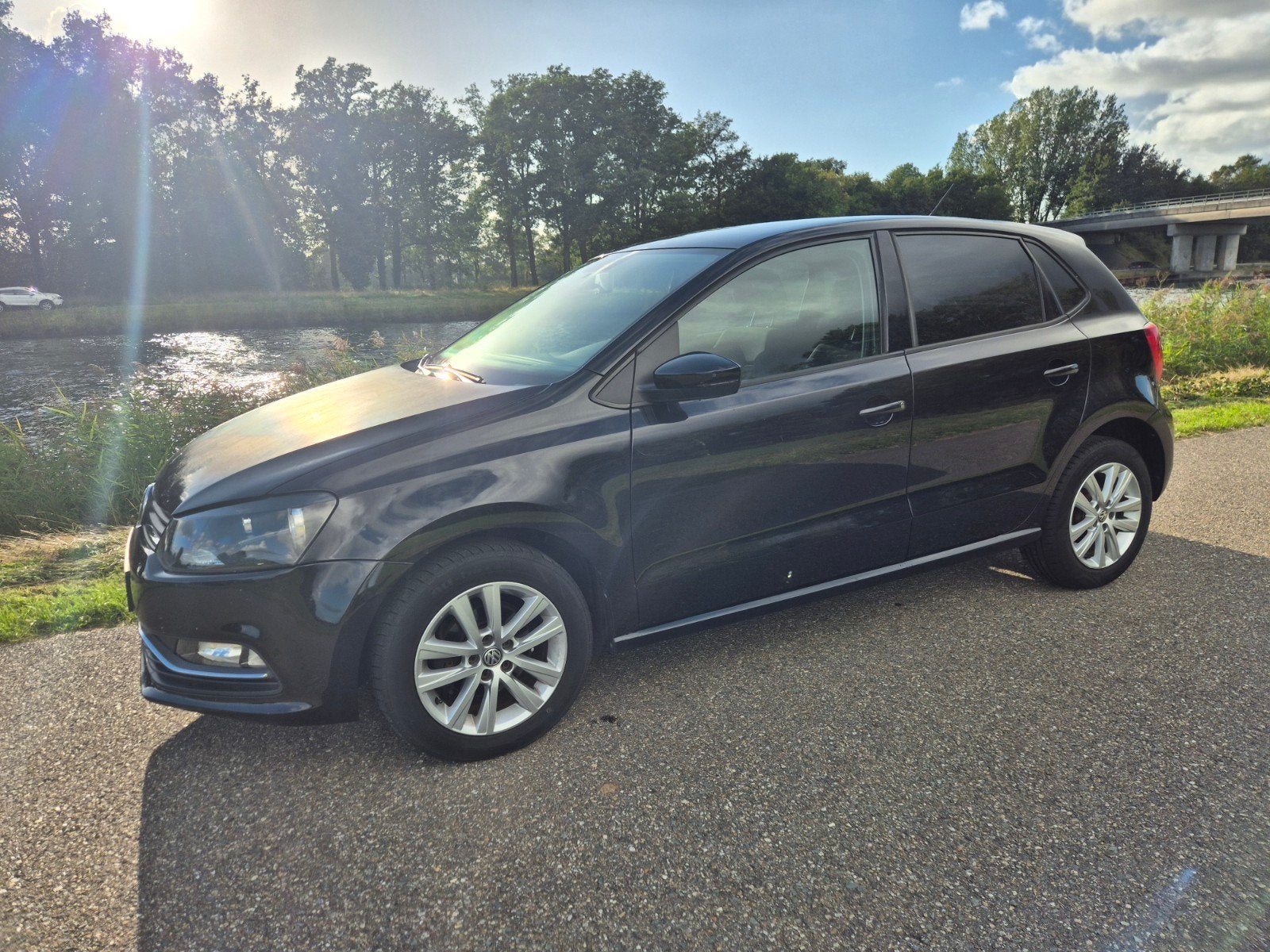 Volkswagen Polo 1.0 TSI 2014, Auto's, Dealer onderhouden, Stof, Zwart, Zwart