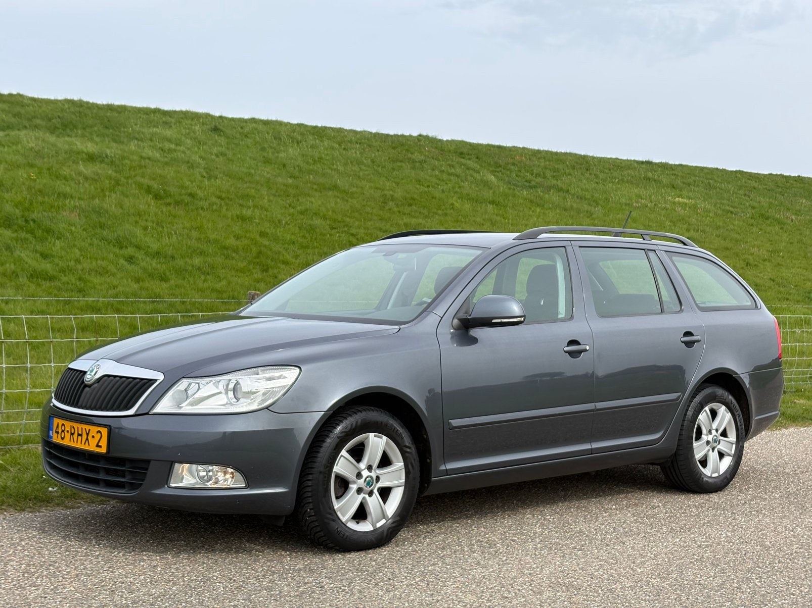 Skoda Octavia 1.2 TSI Combi 2011 Grijs | cruise | clima | pd, Auto's, Skoda, Voorwielaandrijving, Stof, Zwart, 4 cilinders
