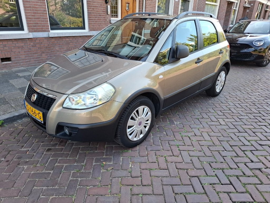 Fiat Sedici 1.6 16V 2WD 2008 Geel, Auto's, Voorwielaandrijving, 4 cilinders, 400 kg, Geel