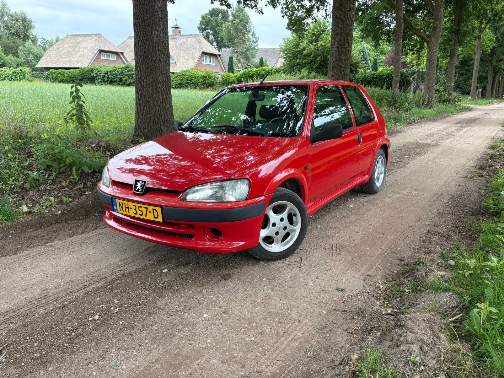 Peugeot 106 1.4 Sport | APK 03-2027 | 172.000 km | Velgen, Auto's, Peugeot, Zwart, 4 cilinders, Leder en Stof, Handgeschakeld