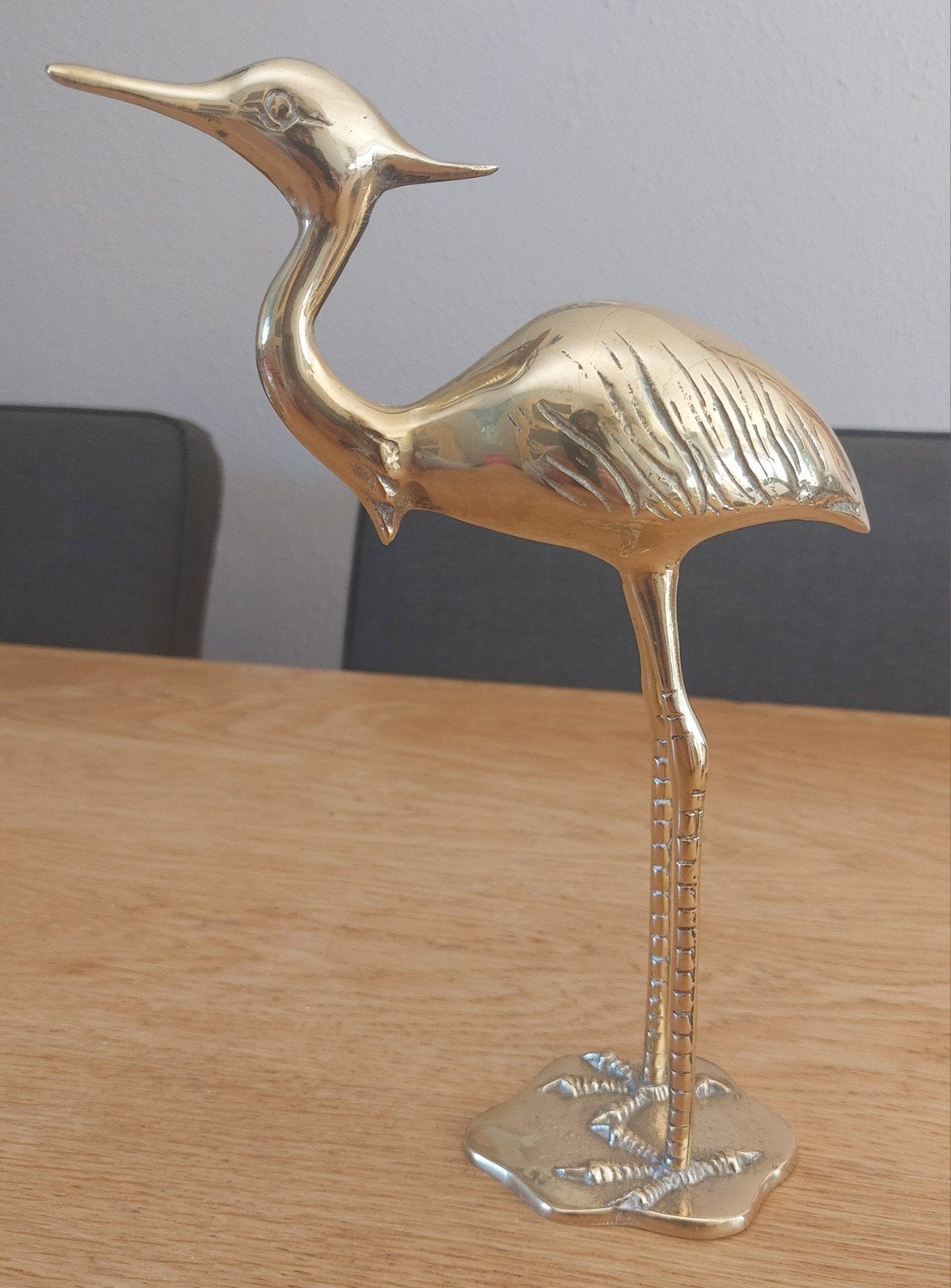 Messing reiger beeld, Ophalen