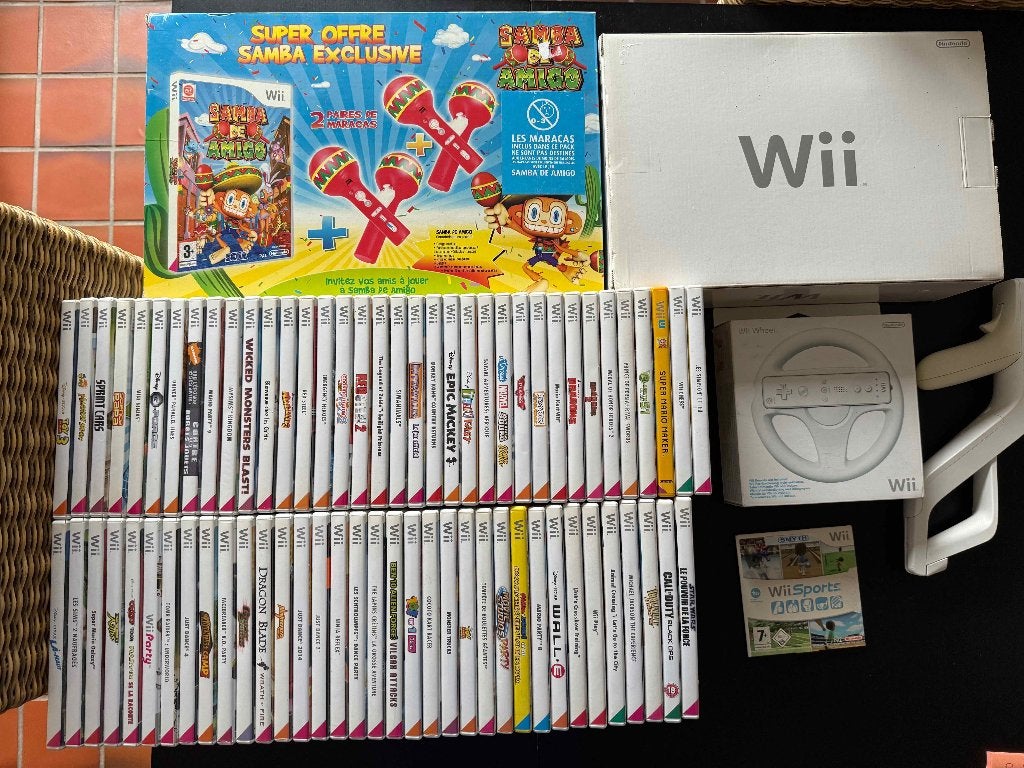 Wii collectie - Console + 71 spellen, Ophalen of Verzenden, Zo goed als nieuw, Met 1 controller, Met stuurtje