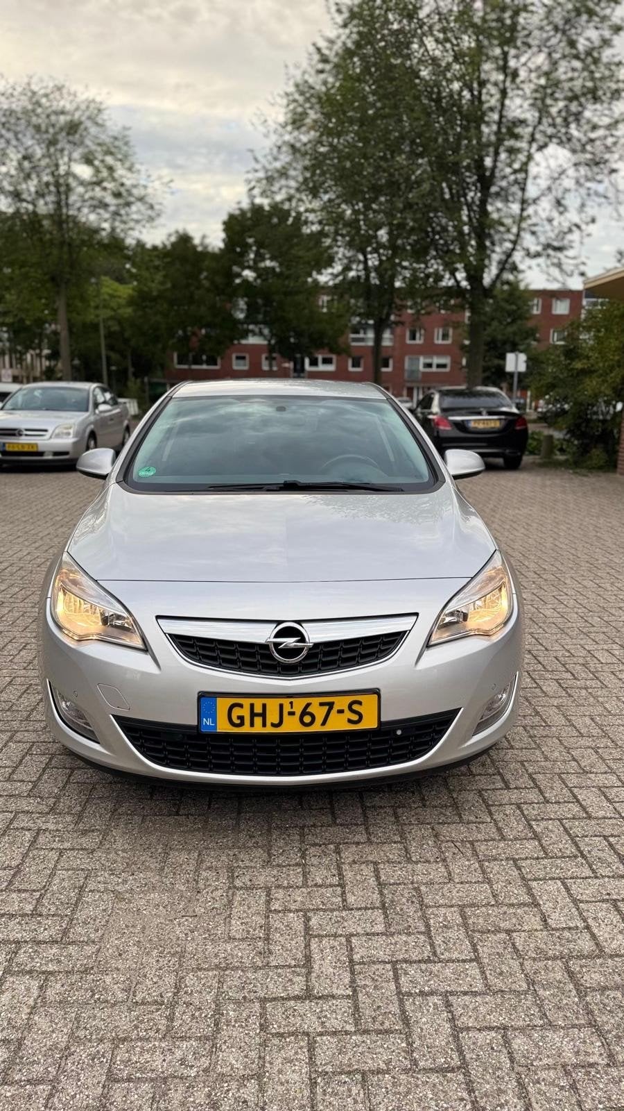 Opel Astra 1.4 Turbo 103KW 5D AUT 2012 Grijs, Auto's, 15 km/l, 4 cilinders, Particulier, 1403 kg
