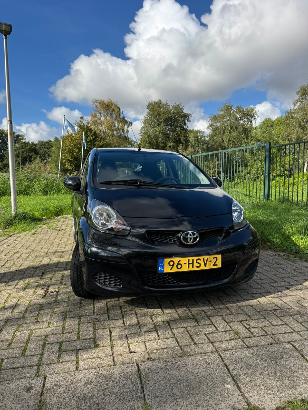 Toyota Aygo 1.0 12V 5DRS 2009 Zwart *DEALER ONDH.* ELECK.RAM, Voorwielaandrijving, Dealer onderhouden, Stof, Zwart