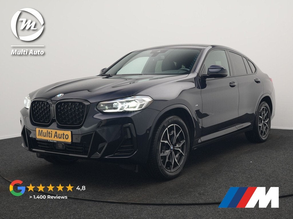 BMW X4 xDrive20i M Sport 184pk Dealer O.H. Carbon Schwarz Me, 1998 cc, Gebruikt, Zwart, 4 cilinders