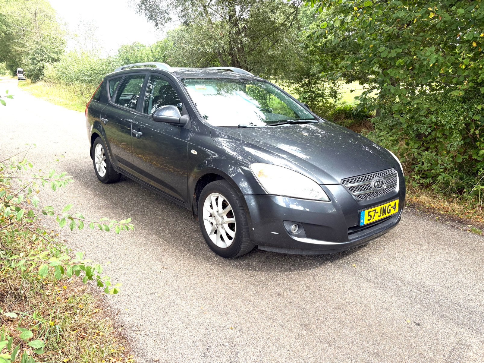 Kia (Pro) Cee d 1.4 Sporty Wagon 2009 Grijs, Auto's, Voorwielaandrijving, 4 cilinders, 1396 cc, Origineel Nederlands