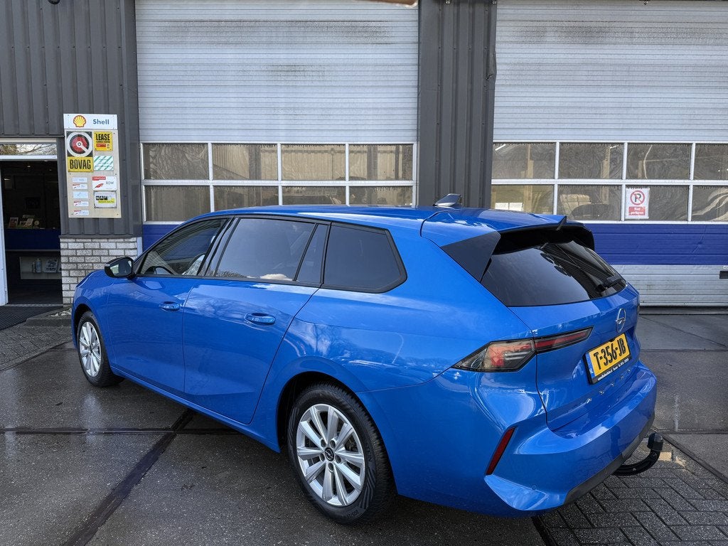 Opel Astra Sports Tourer 1.2 Turbo (bj 2023), Voorwielaandrijving, Gebruikt, 1199 cc, Blauw