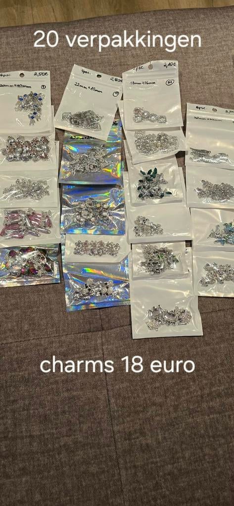 20 verpakkingen metalen hangers, Sieraden, Tassen en Uiterlijk, Ophalen of Verzenden