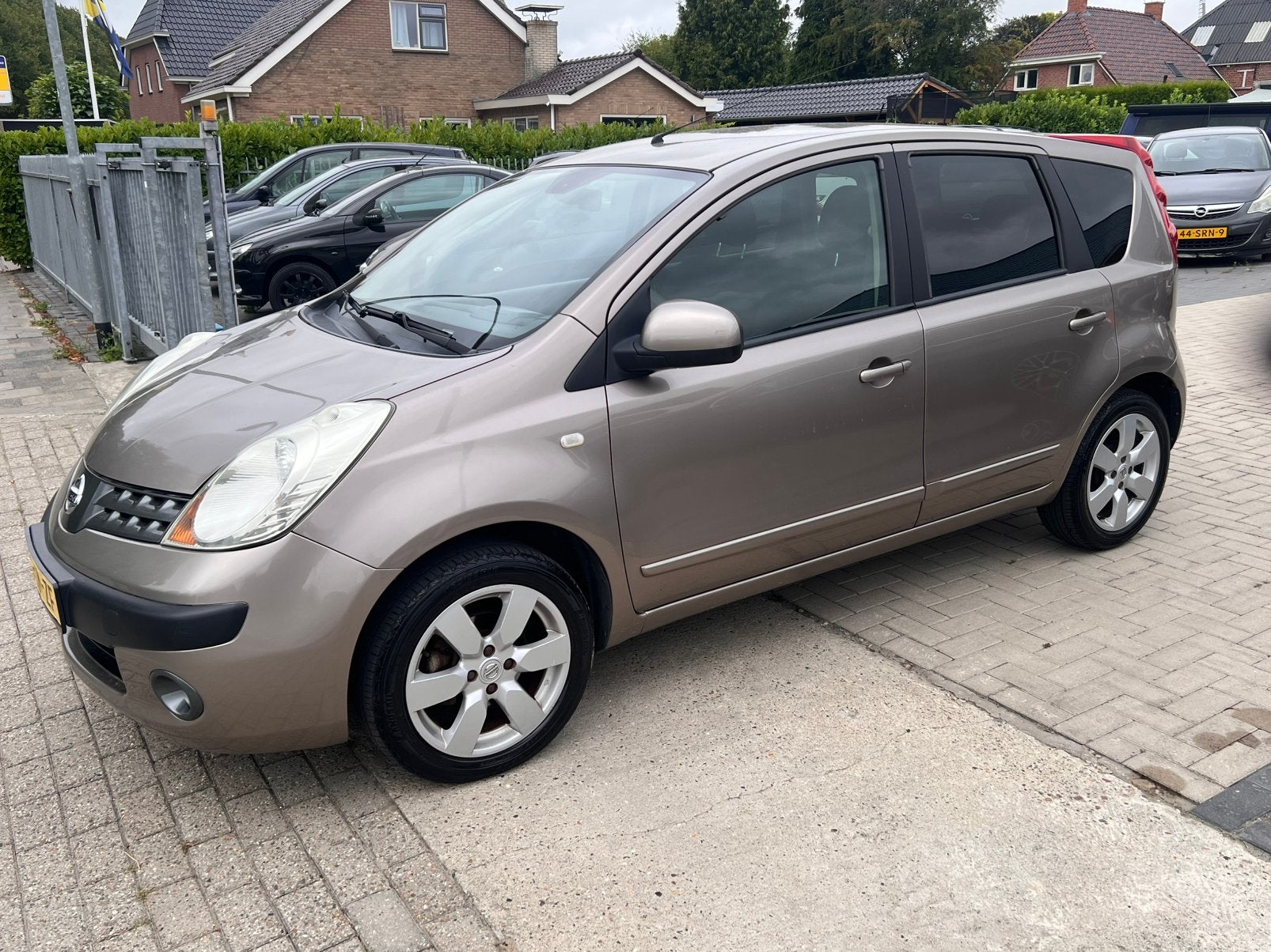 Nissan Note 1.6 16V 2006 Bruin, Auto's, Nissan, Voorwielaandrijving, 15 km/l, 4 cilinders, Bruin