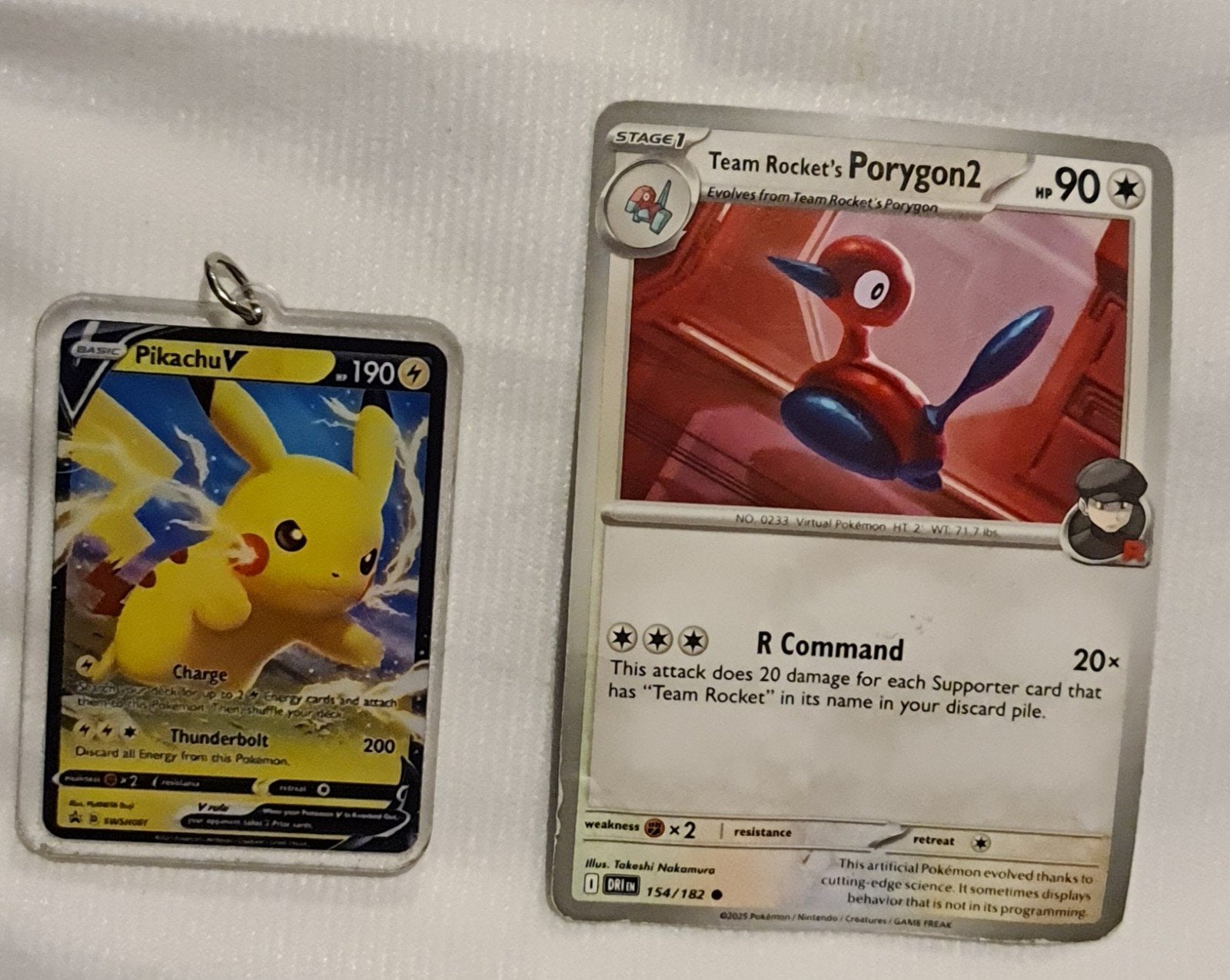 Pokemon Pikachu sleutelhanger & Team Rocket's Porygon2 kaart, Verzenden