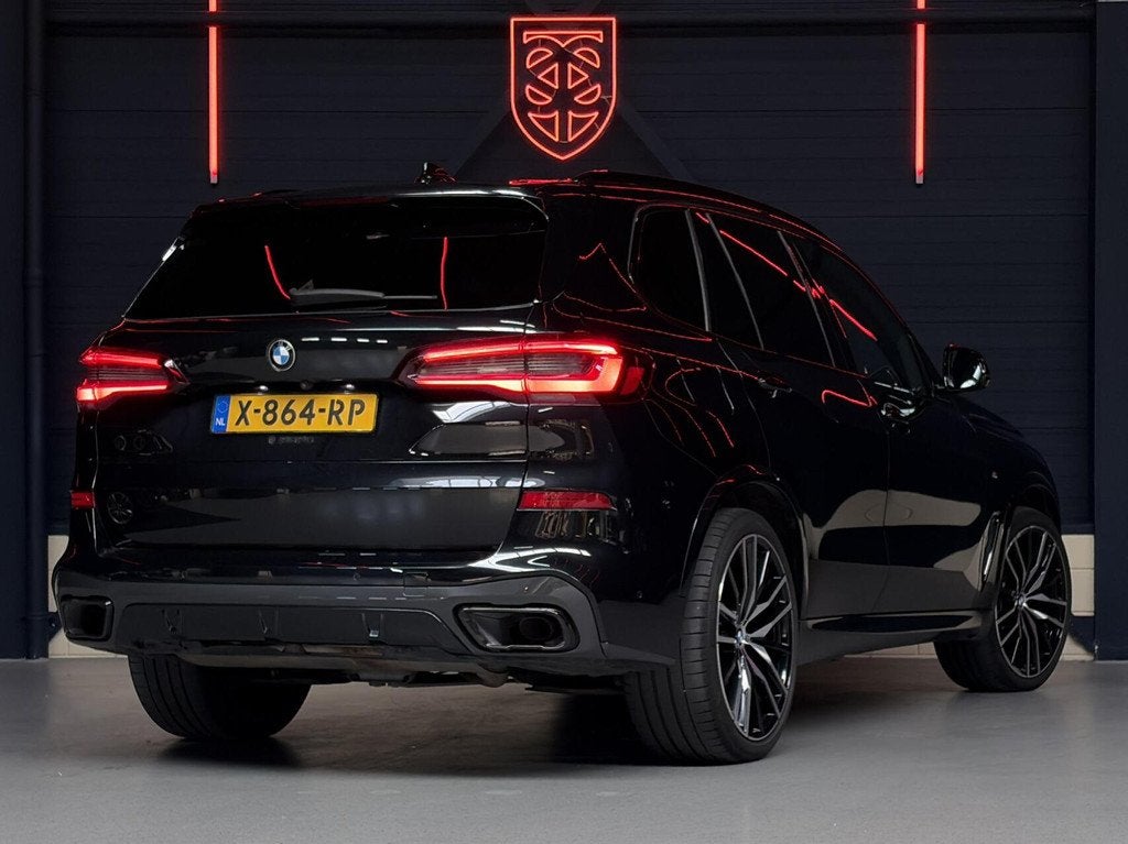 BMW X5 xDrive45e High Exec. M-SPORT|PANO|TREK.|HUD|LASER|ACC, Gebruikt, 394 pk, Zwart, Leder