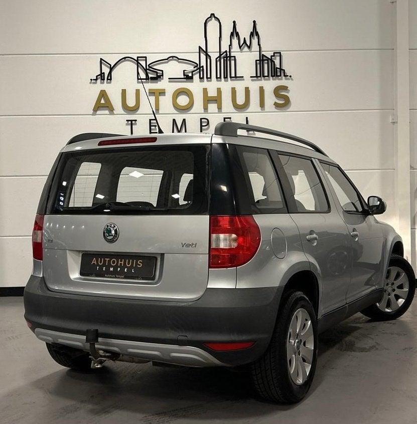 Skoda Yeti 2.0 TDI Active Plus 1e Eigenaar Airco Trekhaak Is, Auto's, Voorwielaandrijving, Euro 5, Stof, Gebruikt