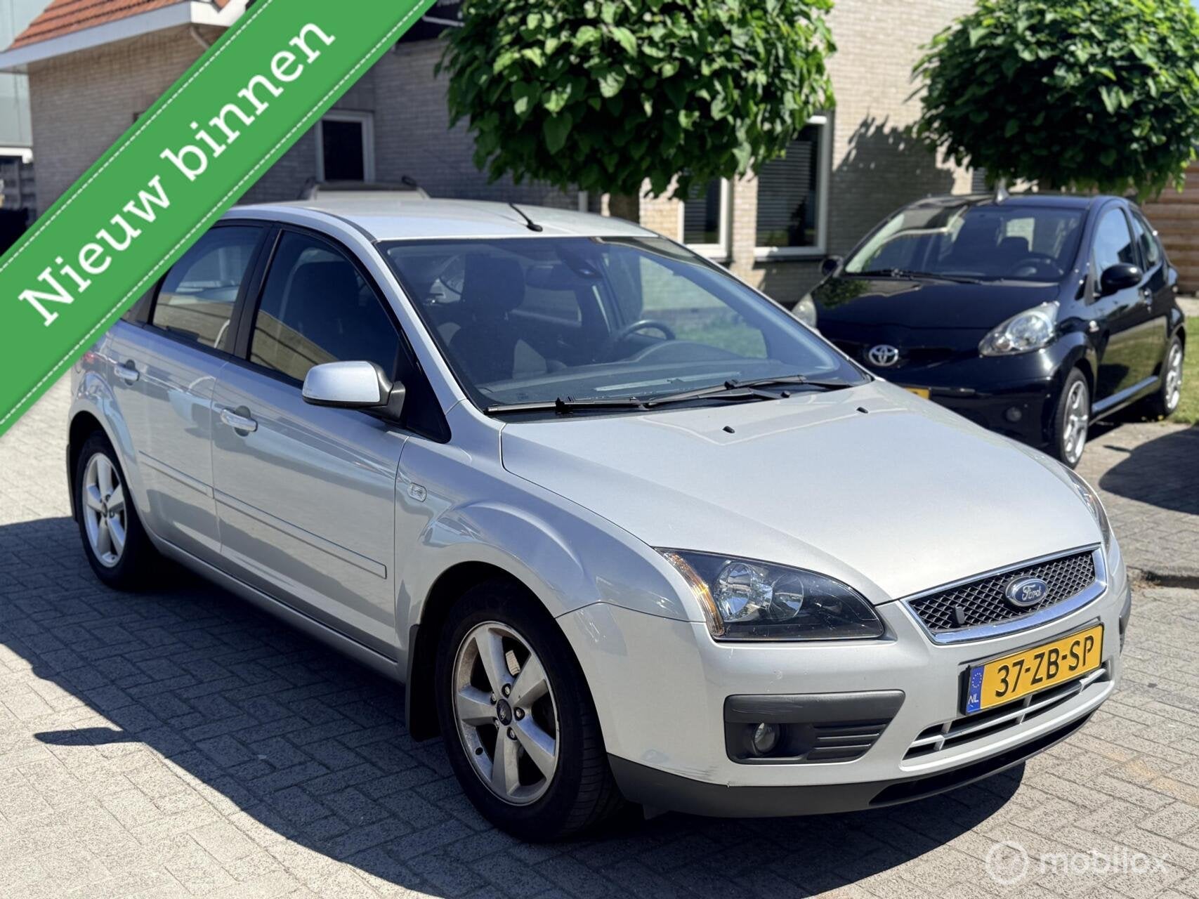 Ford Focus 1.8-16V Ambiente Flexifuel, Auto's, 125 pk, Gebruikt, Emergency brake assist, 4 cilinders