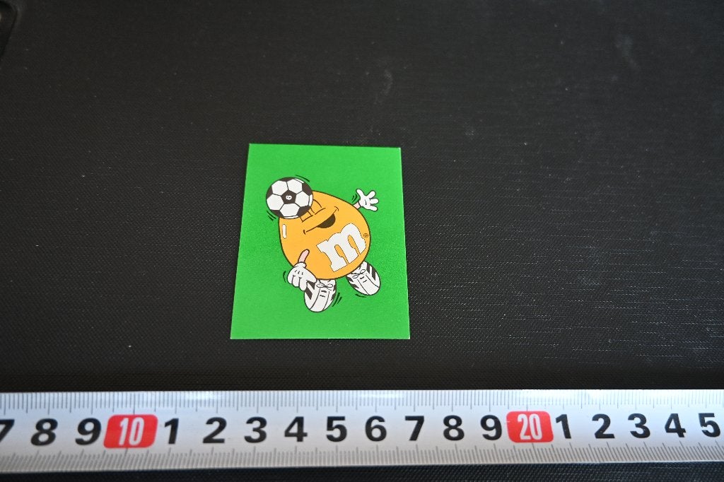 sticker mars 1994 strip M&M's geel voetbal 174, Ophalen of Verzenden, Zo goed als nieuw