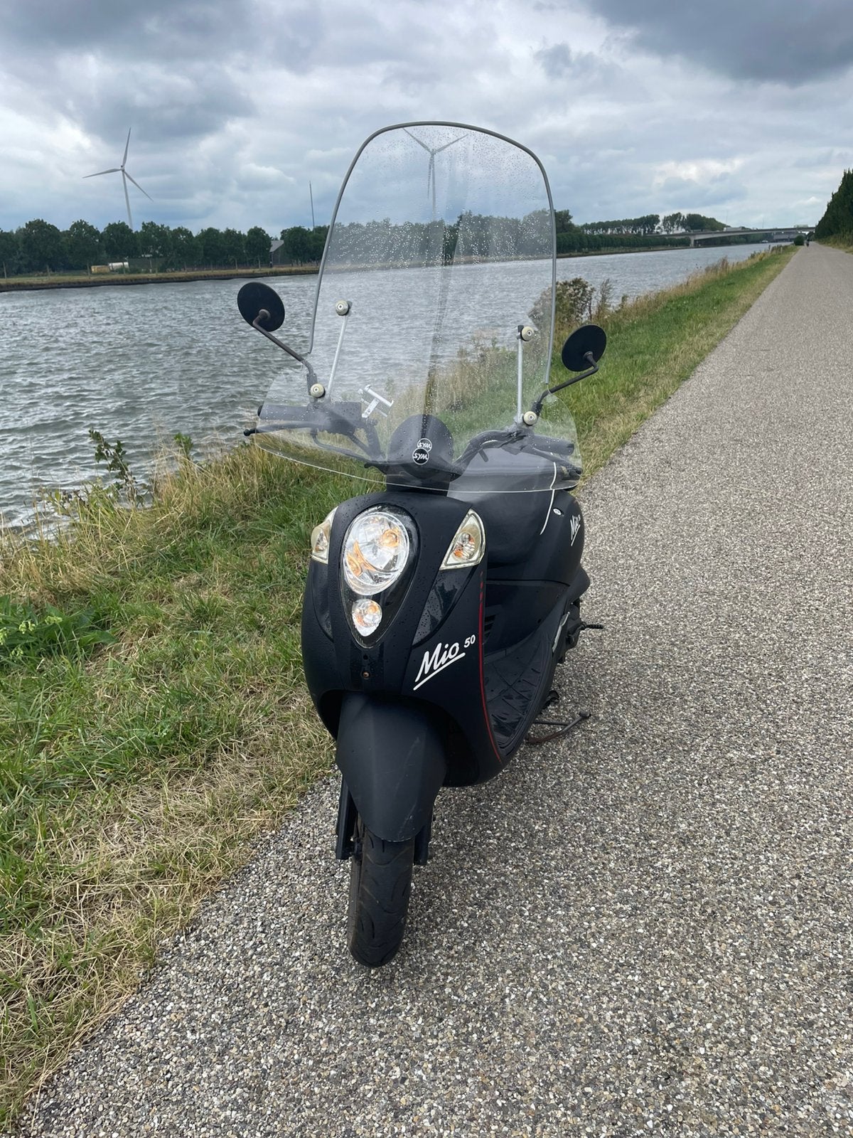 Sym Mio, Fietsen en Brommers, Scooters | SYM, Mio, Nieuw, Ophalen of Verzenden, Benzine