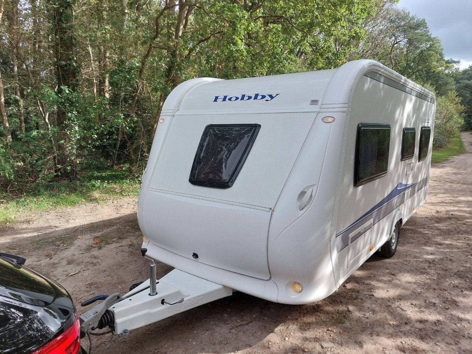 Hobby 495 ufe, 2010 mover, airco, voortent, fietsendrager, Caravans en Kamperen, Rondzit, Hobby, Particulier, Luifel