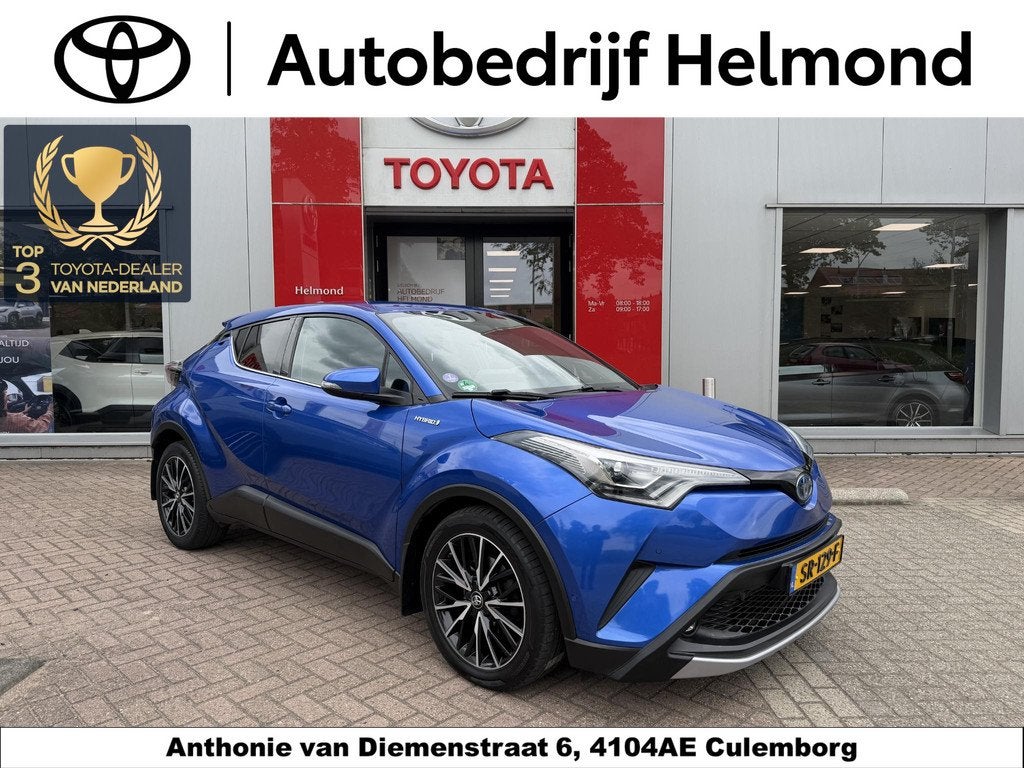 Toyota C-HR 1.8 Hybrid Style Premium Pack, Auto's, Euro 6, 4 cilinders, Blauw, Leder en Stof