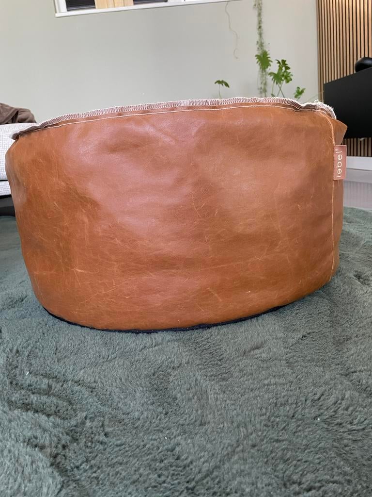 Label poef, Huis en Inrichting, Woonaccessoires | Schalen en Manden, Ophalen of Verzenden, Gebruikt, Rond, Overige materialen