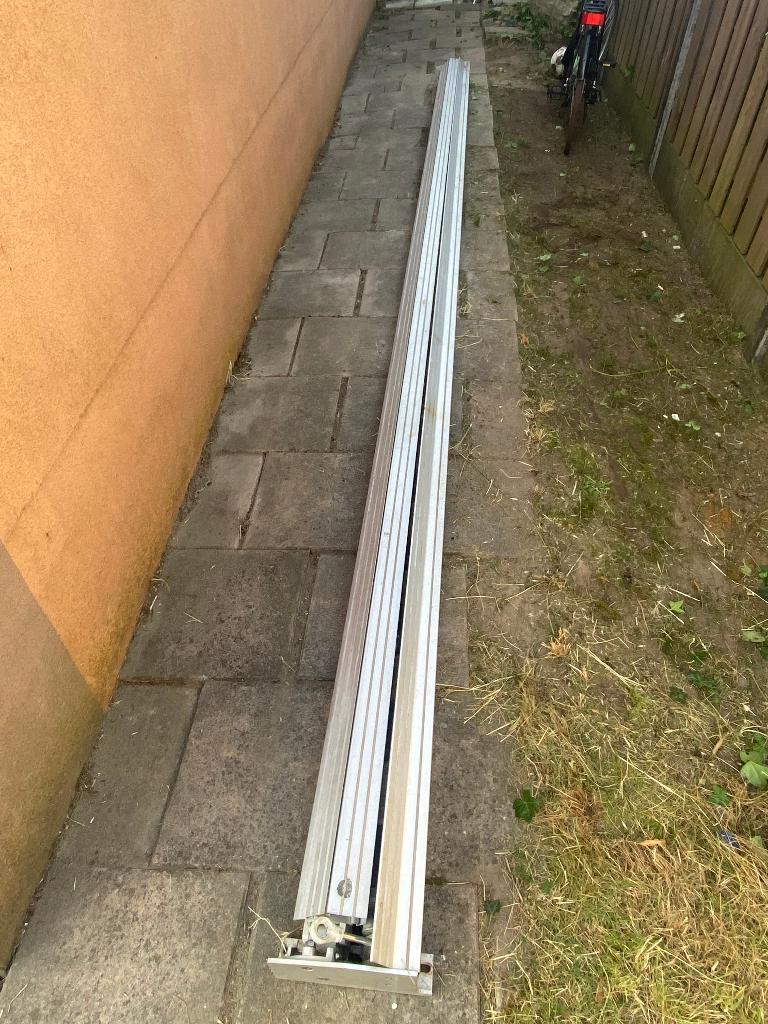 Zonnescherm knikarm 550cm breed, Ophalen, Gebruikt, 450 cm of meer, 150 tot 300 cm