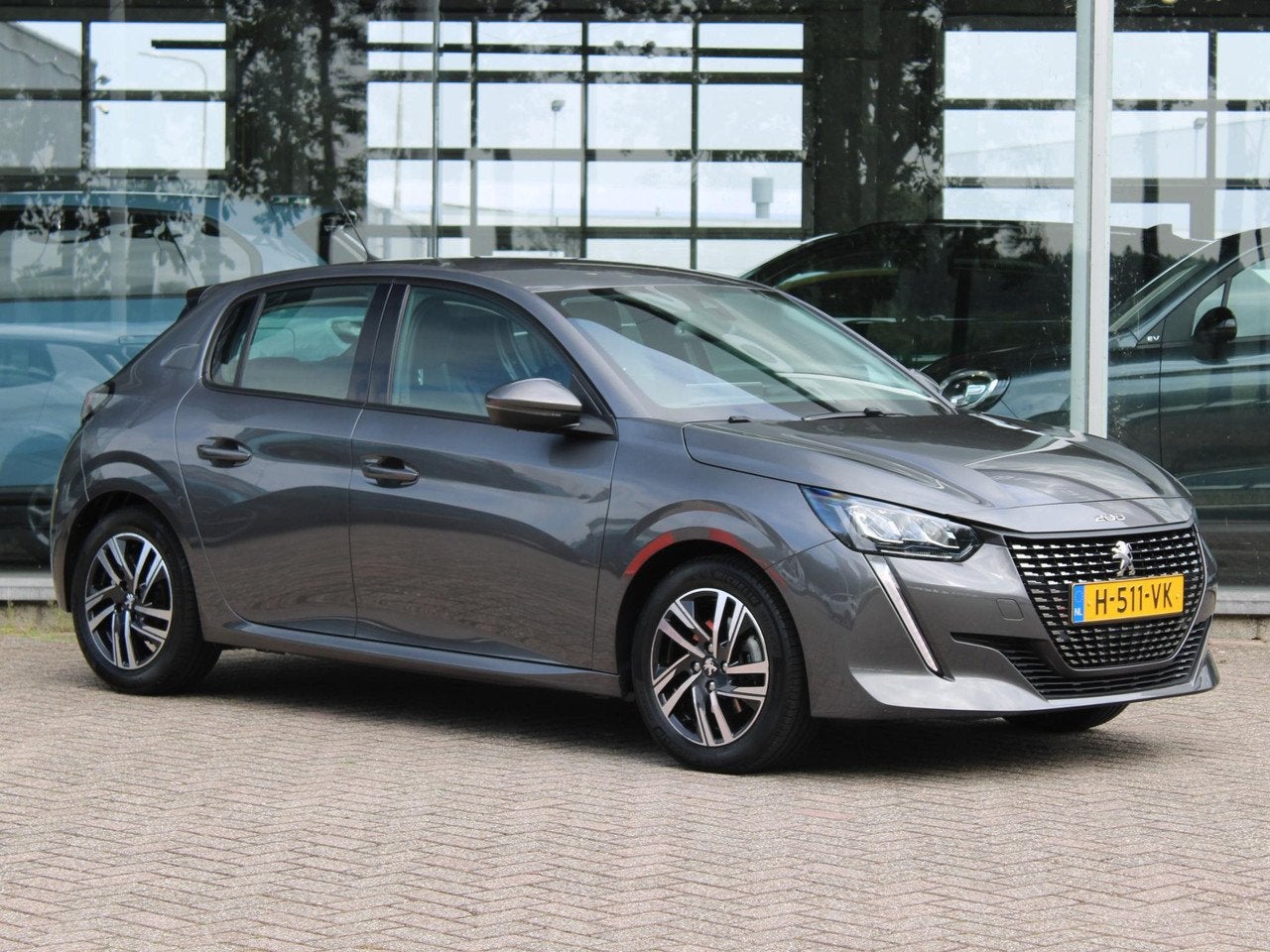 Peugeot 208 1.2T Allure | Trekhaak/Navi/Climate (bj 2020), Auto's, 101 pk, Gebruikt, 1199 cc, 49 €/maand