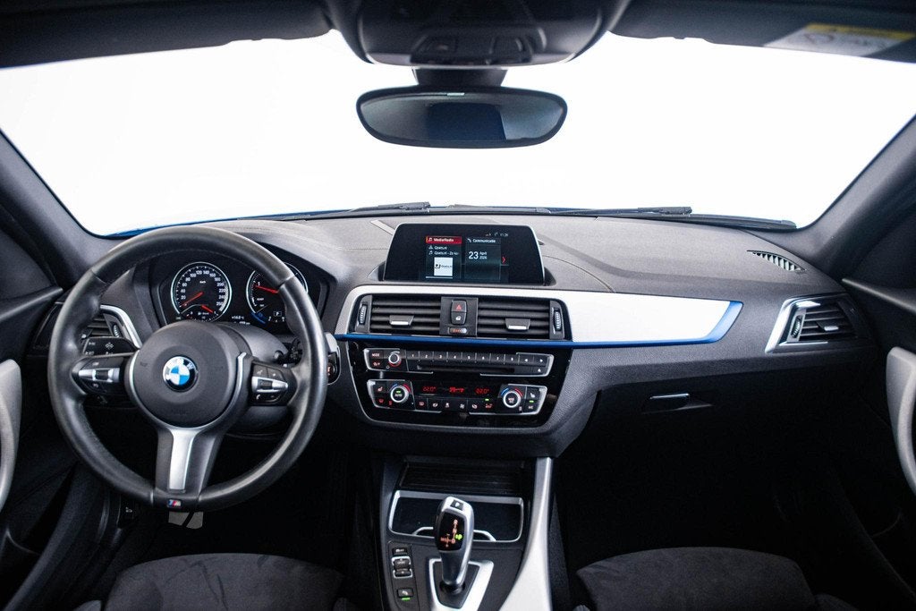 BMW 1-serie 118d M Sport - Cruise Control - Adaptieve LED ko, Auto's, 12 maanden, Achterwielaandrijving, Blauw, Leder