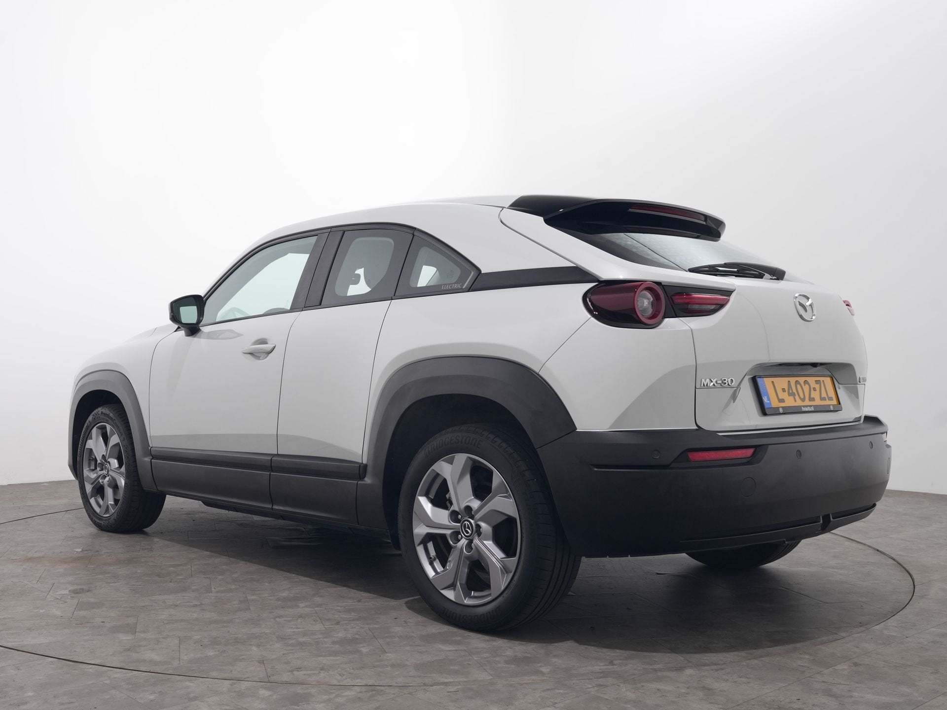Mazda MX-30 E-SKYACTIV 145 COMFORT 36 KWH SOH 93% | Navi | S, Auto's, Stof, Gebruikt, Zwart, 35 kWh
