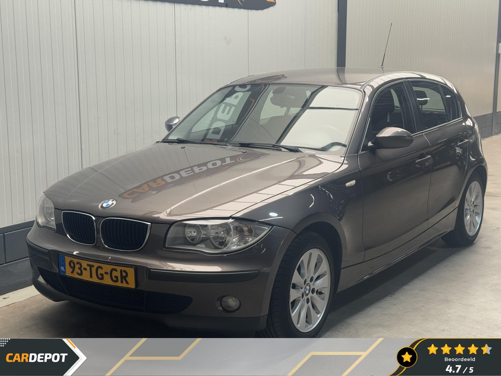 BMW 1-serie 116i Business Line, Auto's, Gebruikt, Zwart, 4 cilinders, Bruin