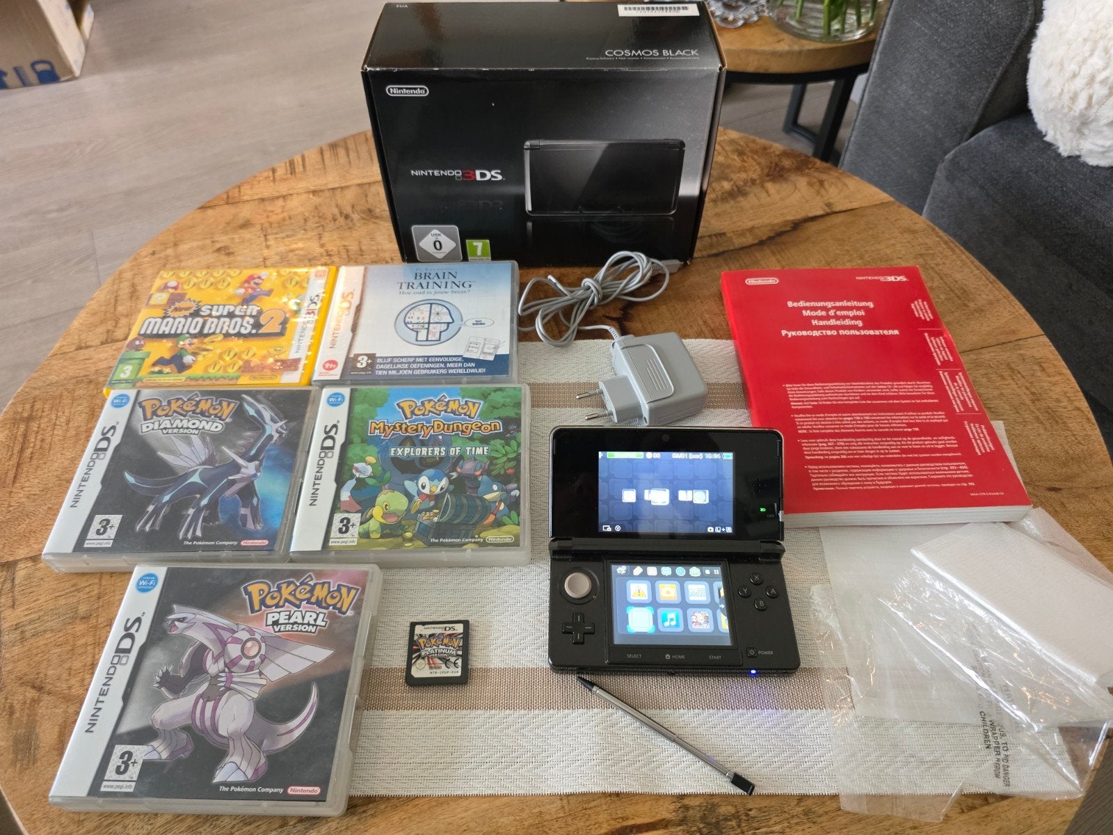 Nintendo 3DS Cosmos Black met 4 Pokémon games en meer, Met games, Zwart, Ophalen of Verzenden, 3DS
