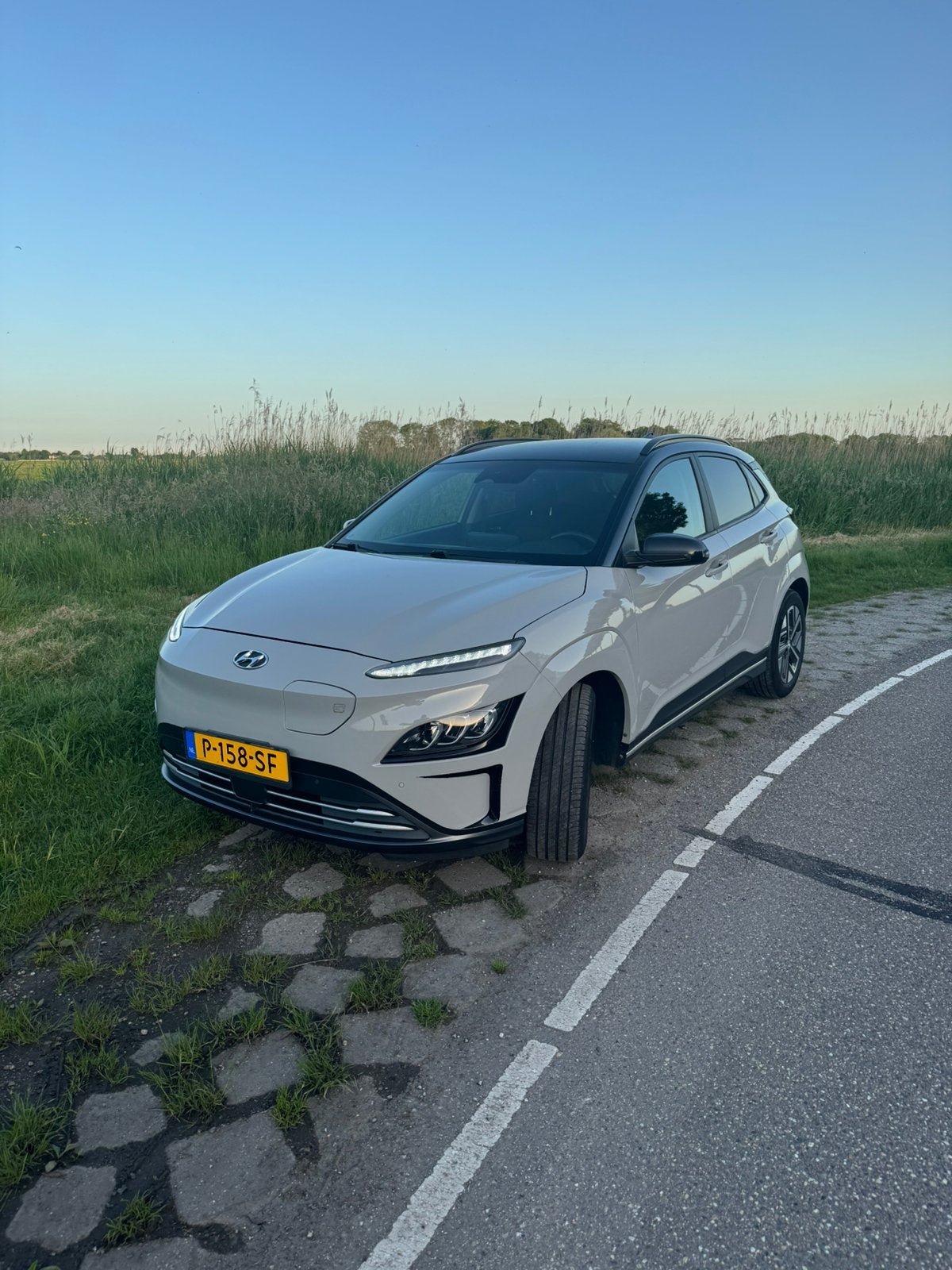 Hyundai Kona EV 136pk 2WD Aut. 2021 Grijs 3fase, warmtepomp,, Auto's, Hyundai, Euro 6, Overige bekleding, 54 min, Elektrisch