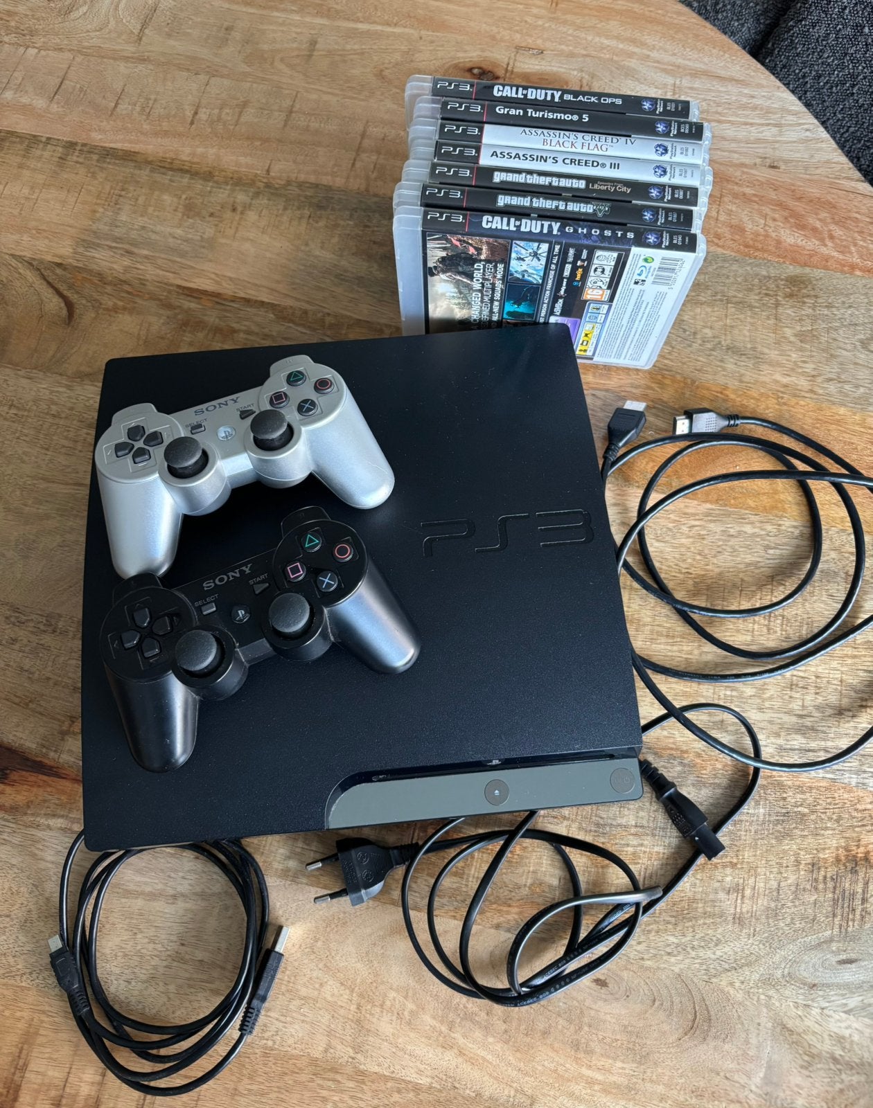 Complete PlayStation 3 Slim + 2 Controllers & 7 spellen, Spelcomputers en Games, Spelcomputers | Sony PlayStation 3, Ophalen of Verzenden
