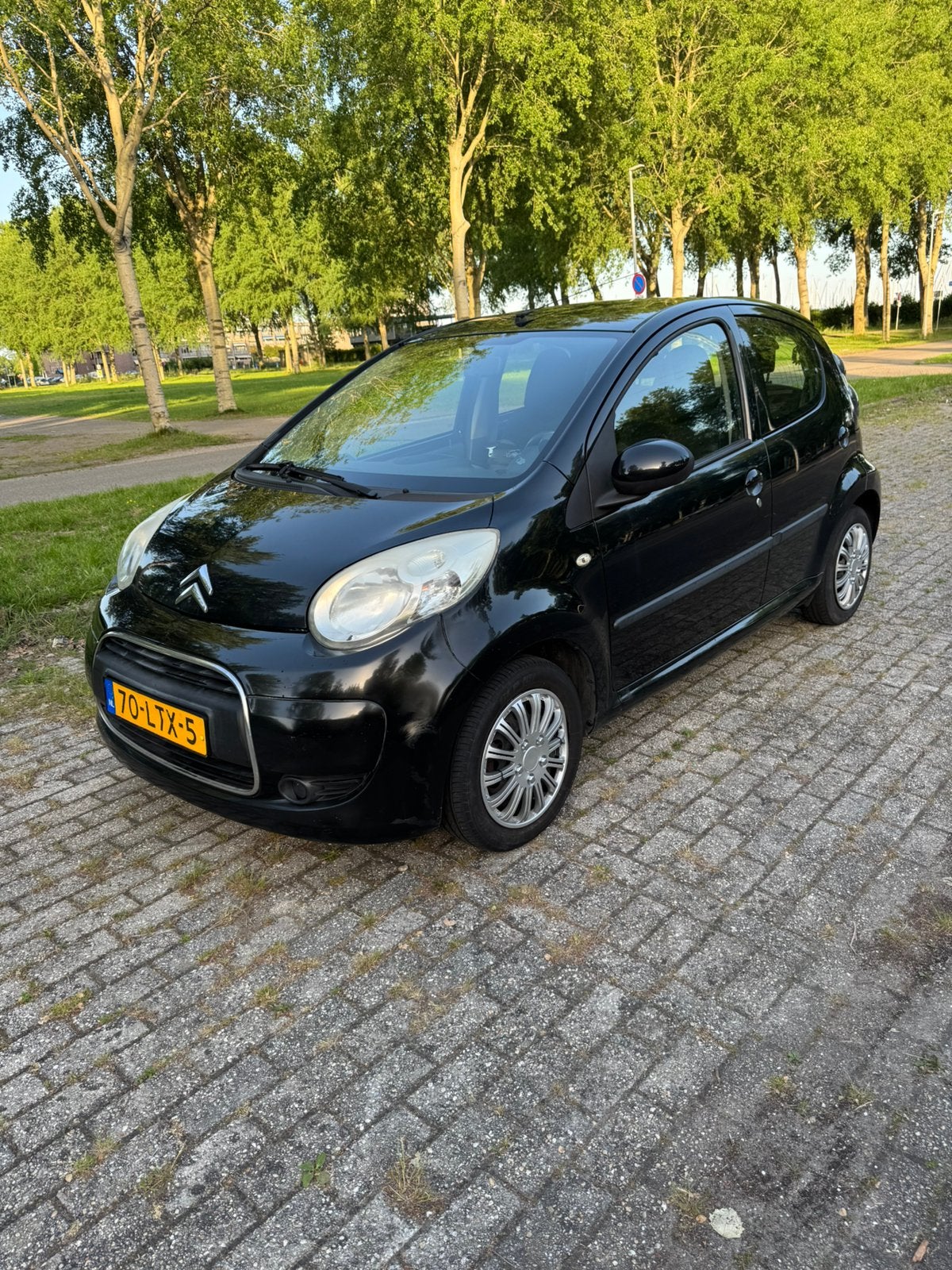 Citroën C1 1.0 5-DRS 2010 Zwart, Auto's, Citroën, Voorwielaandrijving, Stof, 4 stoelen, C1
