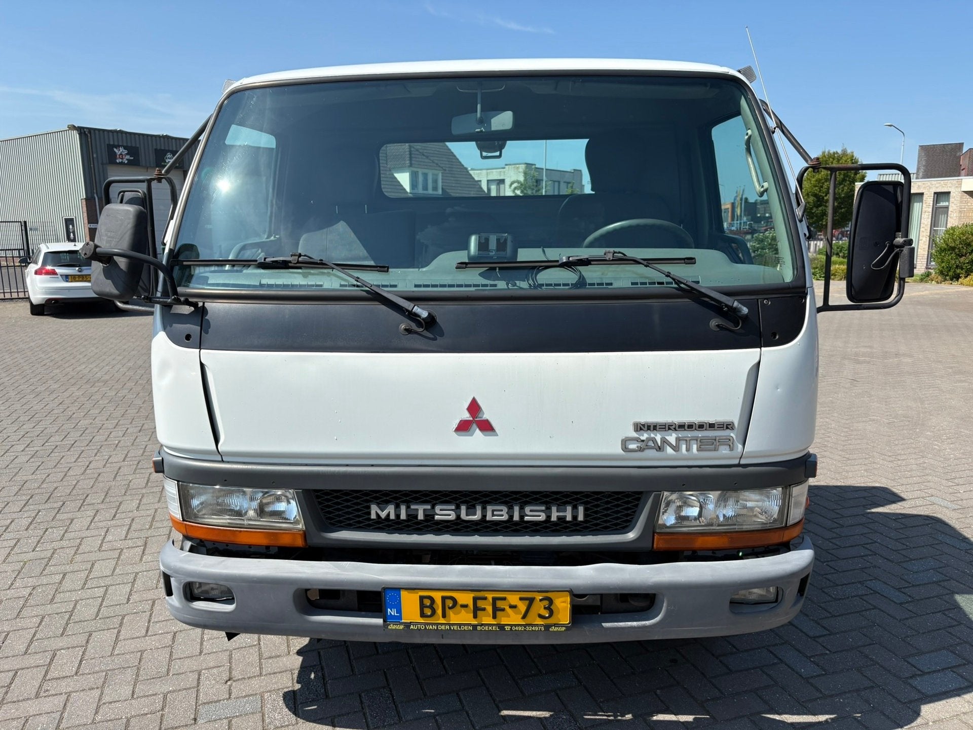 Mitsubishi Canter FE649 Oprijwagen 2004 - met lage km-stand, Auto's, Achterwielaandrijving, 143 pk, Wit, Mitsubishi