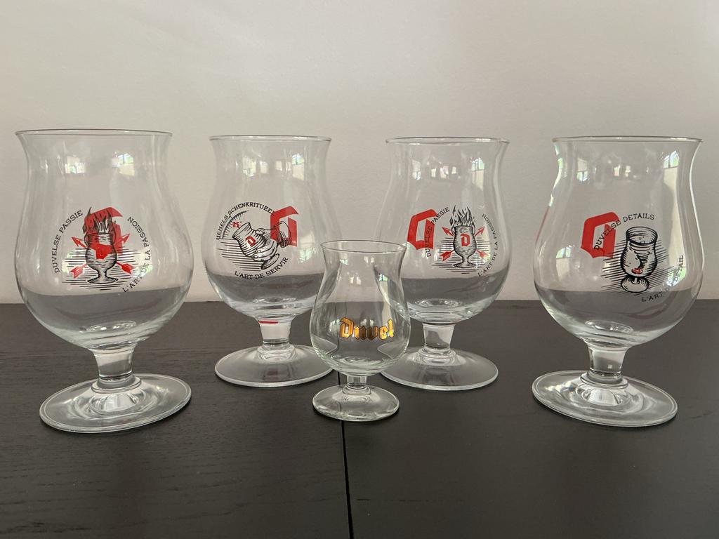 8 Duvel glazen - 7 grote en 1 klein, Ophalen of Verzenden, Zo goed als nieuw, Glas of Glazen, Duvel