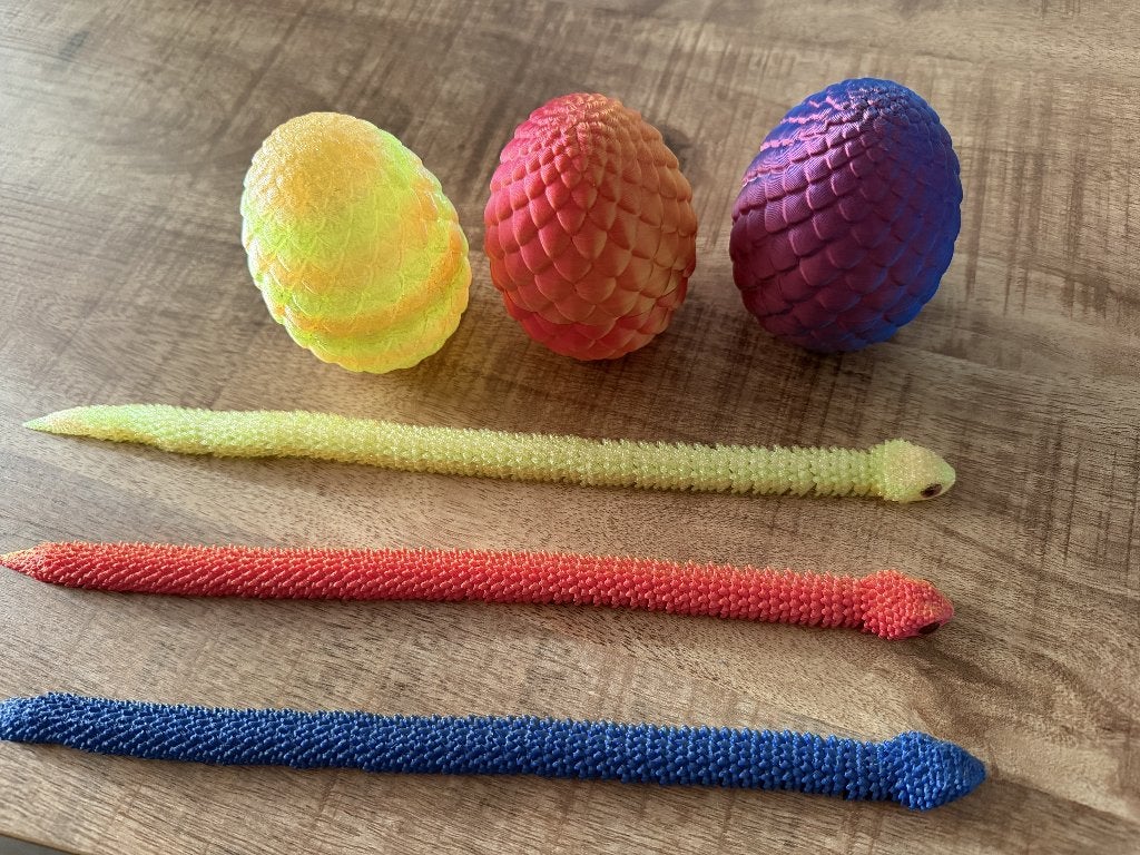 3 fidget slangen met ei, Ophalen, Zo goed als nieuw