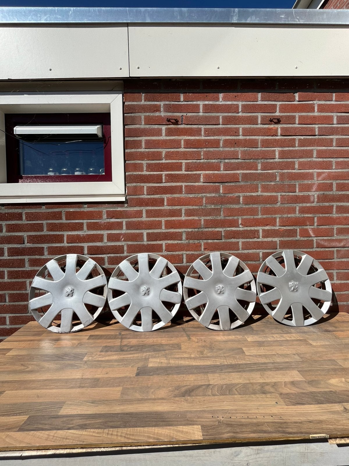 Leuke set Peugeot wieldoppen “14 inch”, Ophalen, Gebruikt